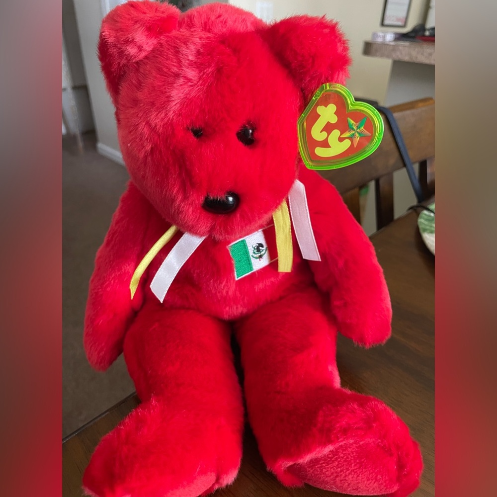 Ty 4299 Vintage Beanie Baby Osito Bear. Tag attached with cover